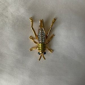 VINTAGE JOAN RIVERS CRICKET PIN
